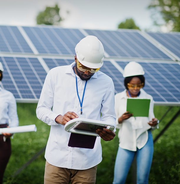 Engineers working with solar panels